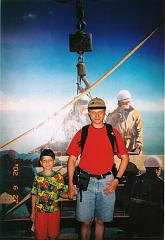 12. CN tower main deck -- Andrew and Roo on construction background